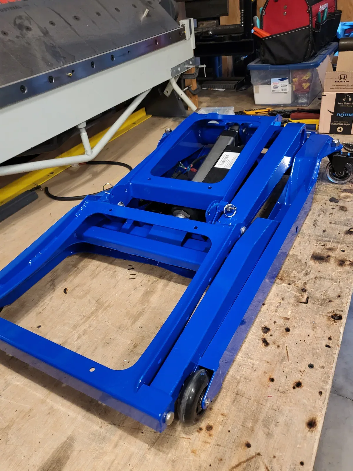 The first blue production frame on the bench
